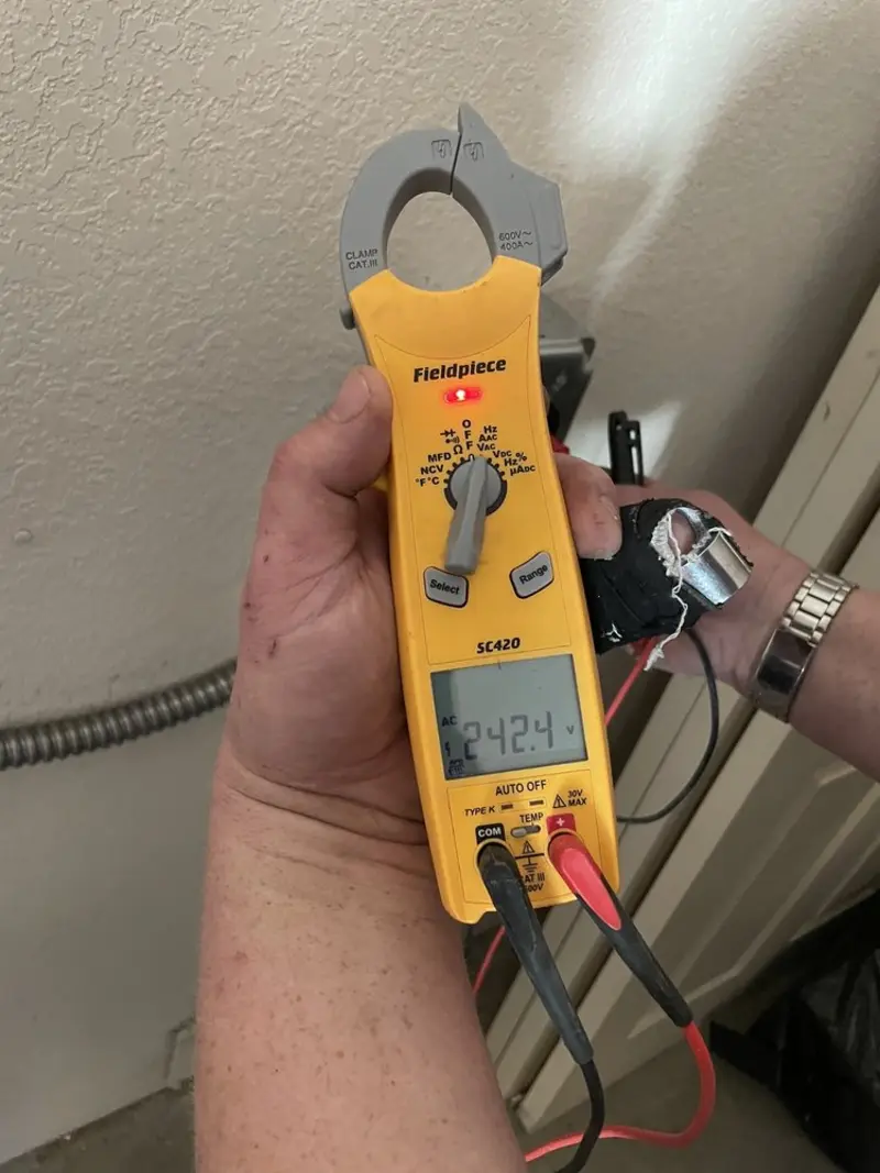 Voltage testing with clamp meter during Hot Tub / Pool Electrical Wiring in Upper Sandusky